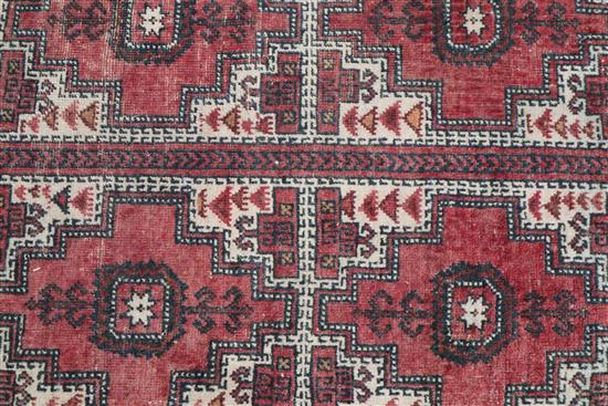A Tekke Bokhara rug and a similar smaller rug 200 x 128cm and 165 x 95cm